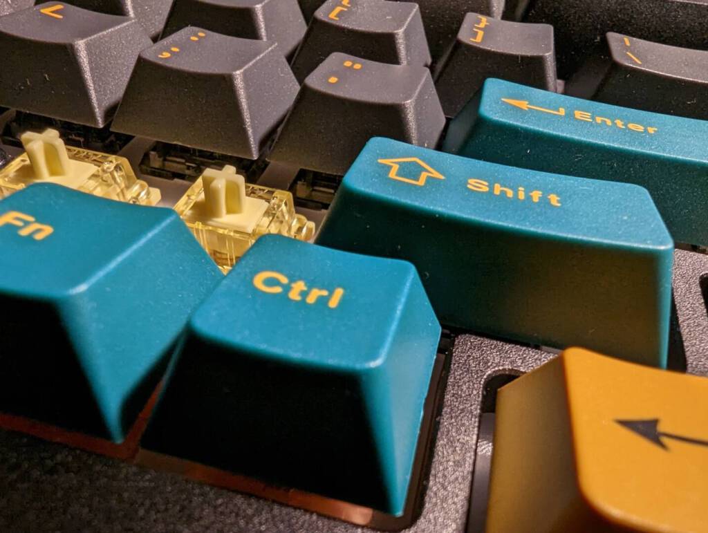 The V3 Cream yellow switches fit with cherry style keycaps like the new Akko MARRS set